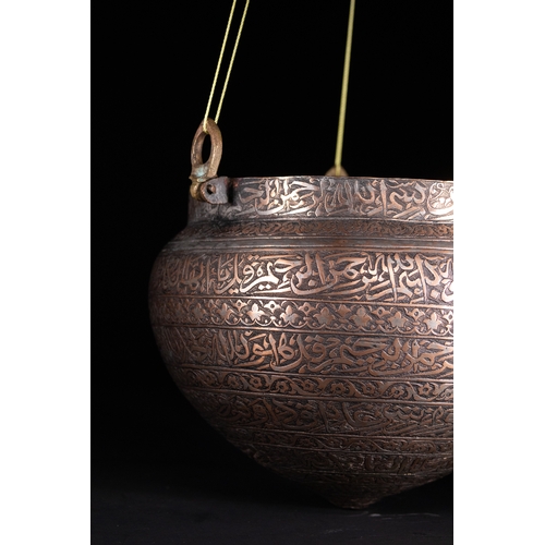 38 - A Cast Brass Hanging Lamp with Arabic Inscriptions, Deccan or Persia, 16th–17th Century.

This cast ... 