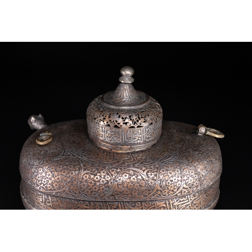 39 - A Rare Safavid Tinned Copper Lidded Kashkul Beggar's Bowl with Arabic Inscriptions, 17th Century.

A... 