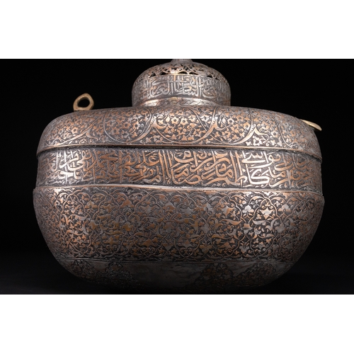 39 - A Rare Safavid Tinned Copper Lidded Kashkul Beggar's Bowl with Arabic Inscriptions, 17th Century.

A... 