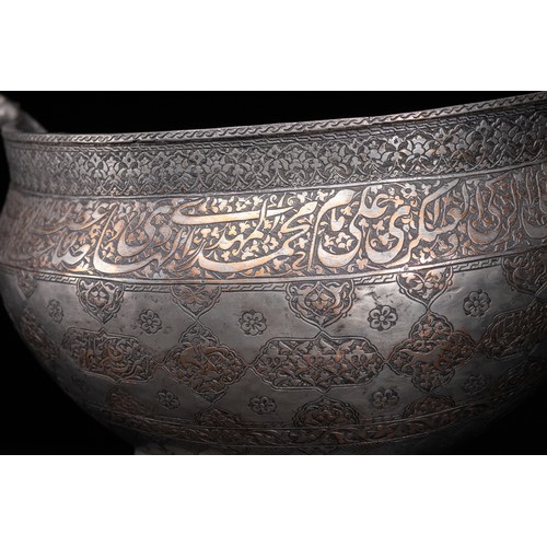 40 - A Safavid Tinned Copper Calligraphic Kashkul Beggar's Bowl, 17th Century.

This finely hammered hemi... 