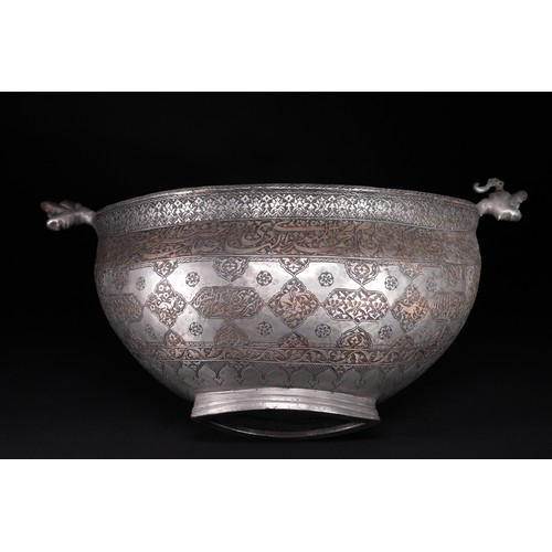 40 - A Safavid Tinned Copper Calligraphic Kashkul Beggar's Bowl, 17th Century.

This finely hammered hemi... 