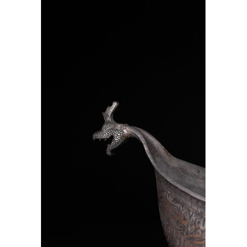 41 - A Tinned Copper Islamic Kashkul Beggar's Bowlwith Dragon-Head Handles, Deccan, 17th Century.

The ka... 