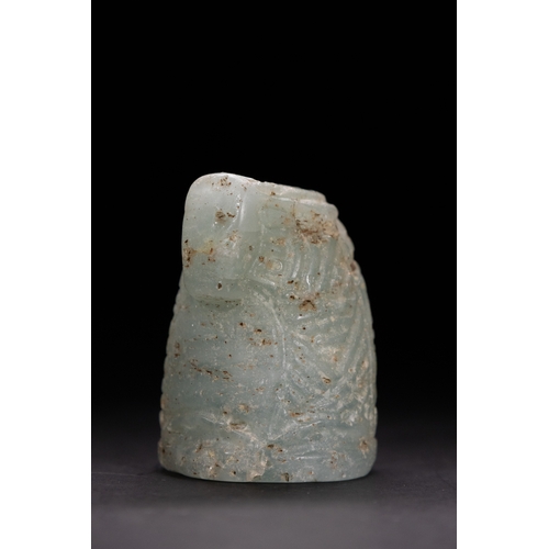 45 - An Islamic Aquamarine Chess Piece, 12th Century.

Carved from aquamarine stone, this chess piece fea... 