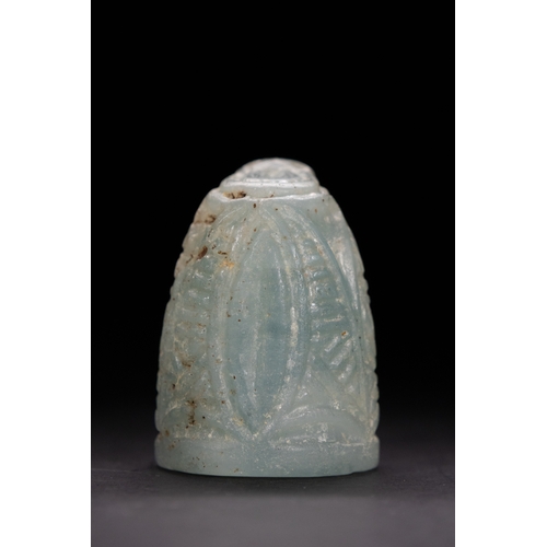 45 - An Islamic Aquamarine Chess Piece, 12th Century.

Carved from aquamarine stone, this chess piece fea... 