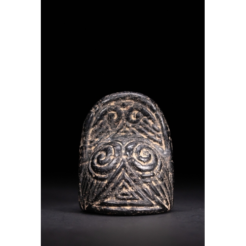 47 - A Fatimid Jet King or Queen Chess Piece, 11th–13th Century.

This jet-black chess piece features a r... 