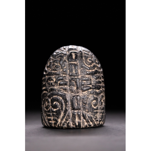 47 - A Fatimid Jet King or Queen Chess Piece, 11th–13th Century.

This jet-black chess piece features a r... 