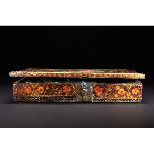 48 - A Qajar Lacquered Merchant’s Scale Box Signed by Hashim of Isfahan, 19th Century.

A richly decorate... 