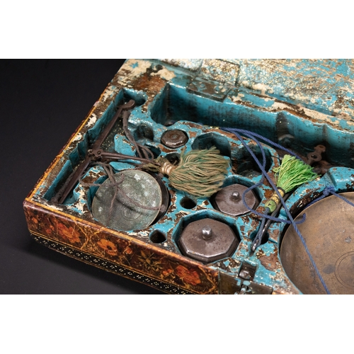 48 - A Qajar Lacquered Merchant’s Scale Box Signed by Hashim of Isfahan, 19th Century.

A richly decorate... 