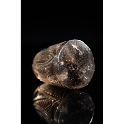 51 - An Islamic Rock Crystal Queen Chess Piece, 13th–16th Century

A finely carved Islamic chess piece in... 