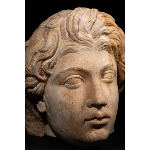 20 - A Roman Marble Head Depicting Antinous, 2nd Century AD.

A finely carved Roman marble head represent... 