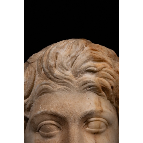20 - A Roman Marble Head Depicting Antinous, 2nd Century AD.

A finely carved Roman marble head represent... 