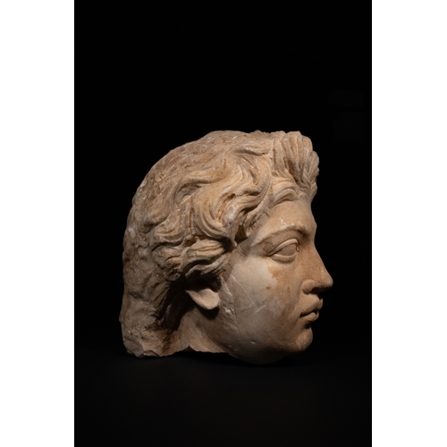 20 - A Roman Marble Head Depicting Antinous, 2nd Century AD.

A finely carved Roman marble head represent... 