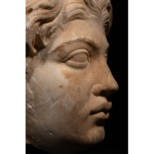 20 - A Roman Marble Head Depicting Antinous, 2nd Century AD.

A finely carved Roman marble head represent... 