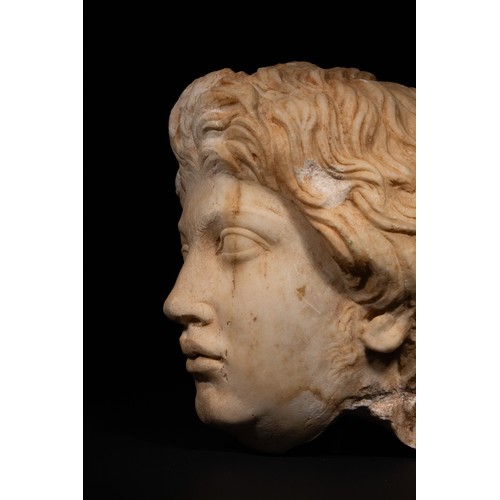 20 - A Roman Marble Head Depicting Antinous, 2nd Century AD.

A finely carved Roman marble head represent... 