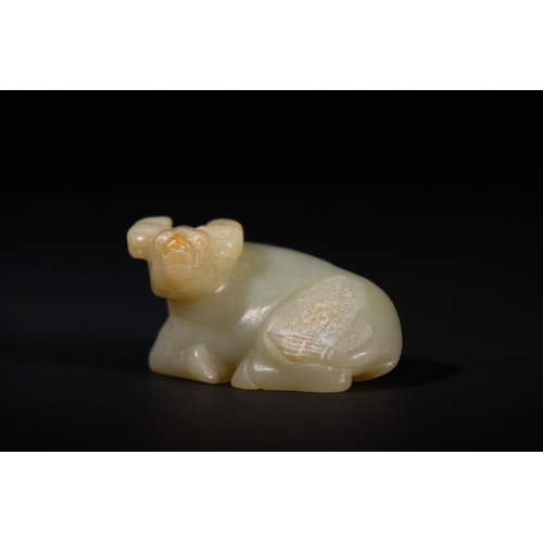 382 - A Chinese Jade Carving of a Recumbent Buffalo. 
The jade carving depicts a buffalo in a resting posi... 