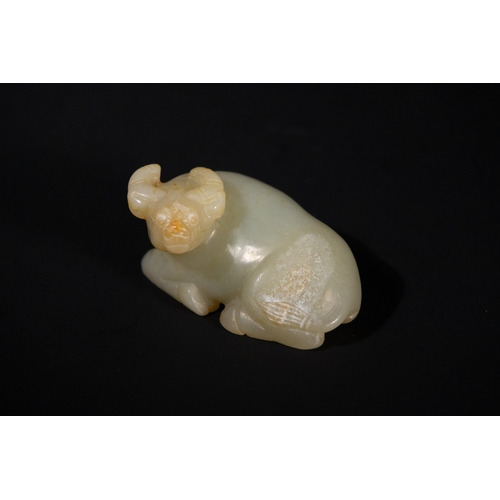 382 - A Chinese Jade Carving of a Recumbent Buffalo. 
The jade carving depicts a buffalo in a resting posi... 