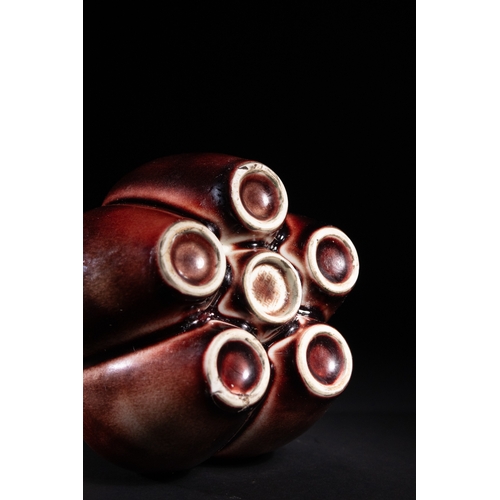 270 - A Chinese Sang de Boeuf Glazed Porcelain Five-Neck Vase - A multi-necked porcelain vase featuring a ... 