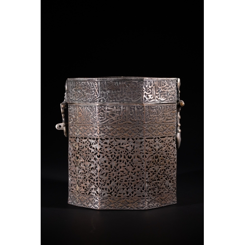 117 - An Indo-Persian Pierced Calligraphic Tinned Copper Casket, 19th Century - An octagonal metal casket,... 