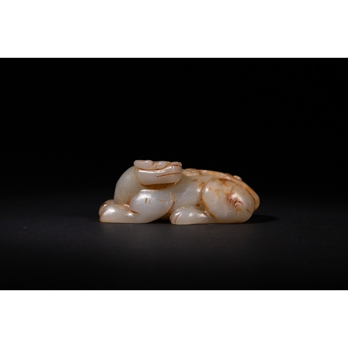 340 - A Chinese Carved Jade Recumbent Mythical Beast - A finely carved Chinese jade recumbent mythical bea... 