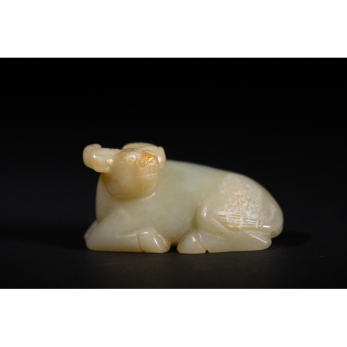 382 - A Chinese Jade Carving of a Recumbent Buffalo. 
The jade carving depicts a buffalo in a resting posi... 