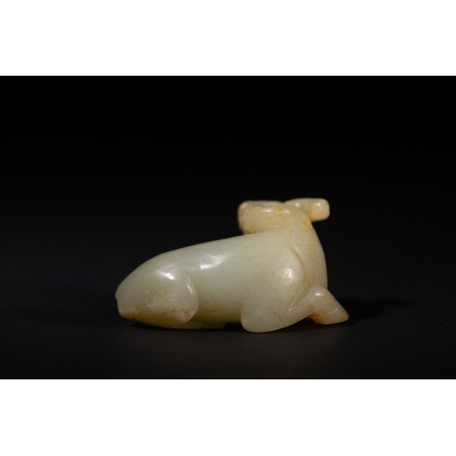 382 - A Chinese Jade Carving of a Recumbent Buffalo. 
The jade carving depicts a buffalo in a resting posi... 