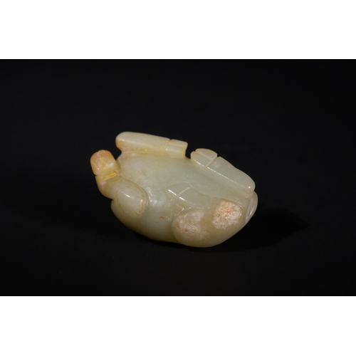 382 - A Chinese Jade Carving of a Recumbent Buffalo. 
The jade carving depicts a buffalo in a resting posi... 