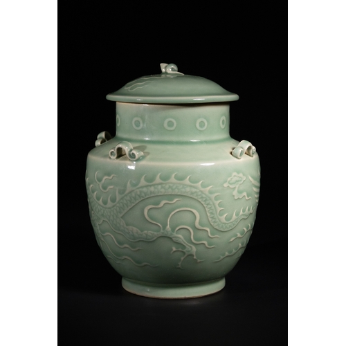 271 - A Chinese Longquan Kiln Celadon Porcelain Dragon and Phoenix Jar, Possibly Yuan Dynasty - A lidded c... 