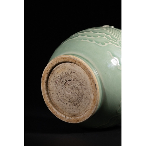 271 - A Chinese Longquan Kiln Celadon Porcelain Dragon and Phoenix Jar, Possibly Yuan Dynasty - A lidded c... 