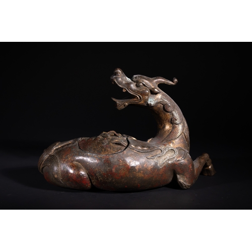 318 - A Chinese Gilt-Bronze 'Qilin' Censer, 19th Century - A cast bronze vessel sculpted in the form of a ... 