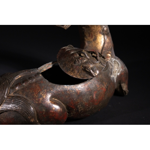 318 - A Chinese Gilt-Bronze 'Qilin' Censer, 19th Century - A cast bronze vessel sculpted in the form of a ... 