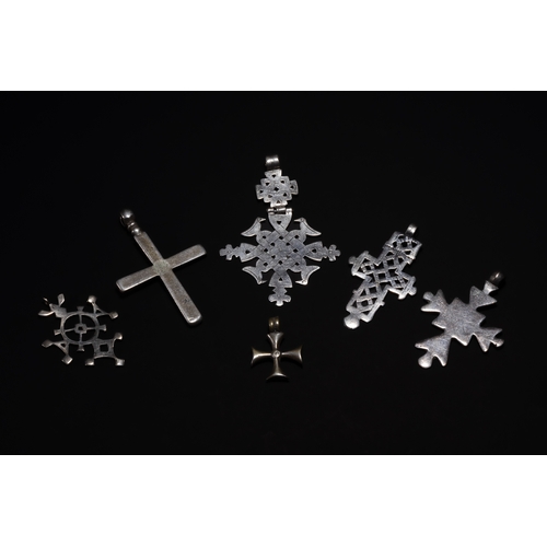 22 - A Collection of Ethiopian Coptic Silver Cross Pendants.

A group of Ethiopian Coptic cross pendants,... 