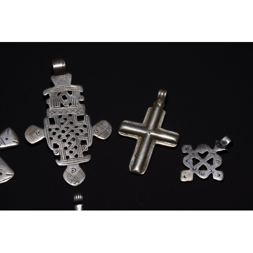 25 - A Collection of Ethiopian Coptic Silver Cross Pendants.

A varied collection of Ethiopian Coptic cro... 