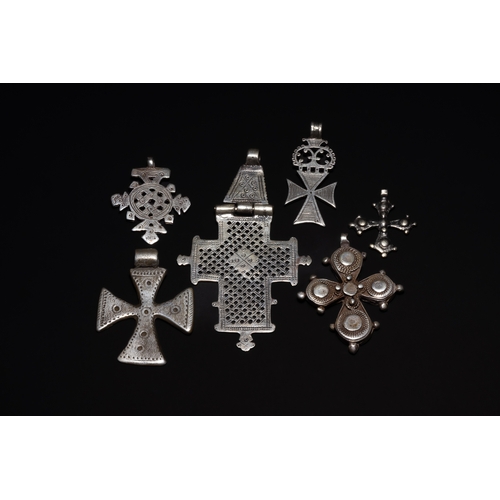 27 - A Collection of Ethiopian Coptic Silver Cross Pendants.

A group of Ethiopian Coptic cross pendants,... 