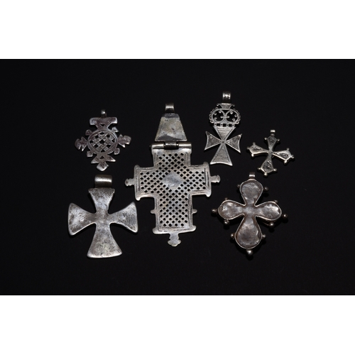 27 - A Collection of Ethiopian Coptic Silver Cross Pendants.

A group of Ethiopian Coptic cross pendants,... 