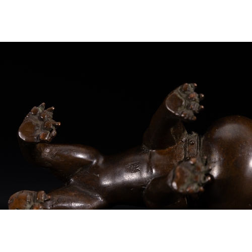 483 - A Japanese Bronze Bulldog Figure with Collar and Bell.

A solid bronze figure modelled as a standing... 