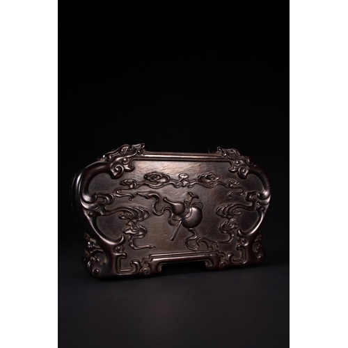 427 - A Chinese Carved Hardwood Rectangular Box with Auspicious Motifs.

A Chinese rectangular wooden box ... 