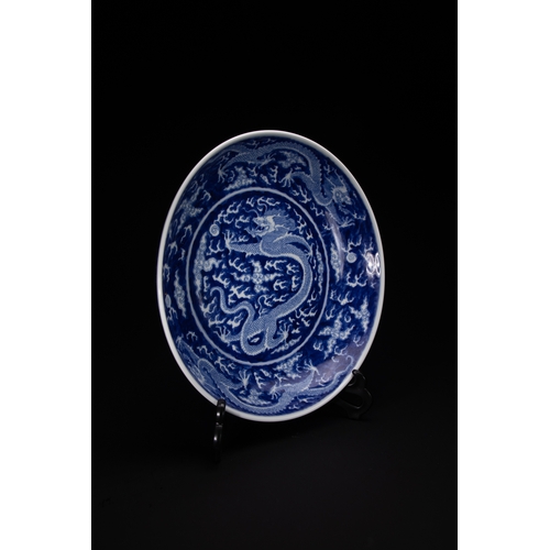 440 - A Chinese Blue and White ‘Five-Clawed Dragon’ Dish, Kangxi Mark.

A Chinese porcelain dish decorated... 