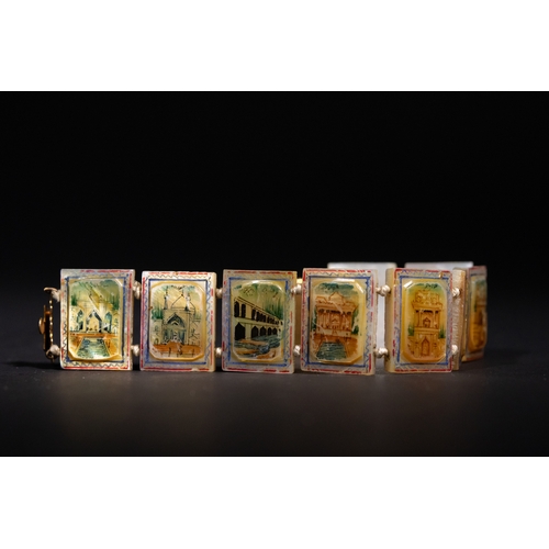 31 - A Persian Mother-of-Pearl Bracelet with Painted Enamel Scenes, 20th Century.

Composed of rectangula... 