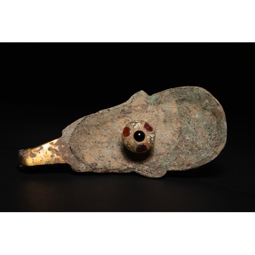 462 - A Chinese Gilt Bronze Belt Buckle with Inset Jade, Agate and Turquoise Beads, 19th Century.

A Chine... 