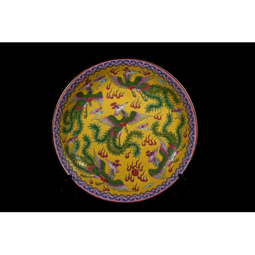311 - A Chinese Polychrome Enamel 'Fenghuang' Porcelain Bowl, Tongzhi Mark. - A Chinese polychrome enamel ... 