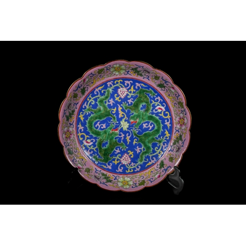 312 - A Chinese Polychrome Enamel Dragon Scalloped Plate, Qianlong Mark. - A Chinese porcelain scalloped p... 