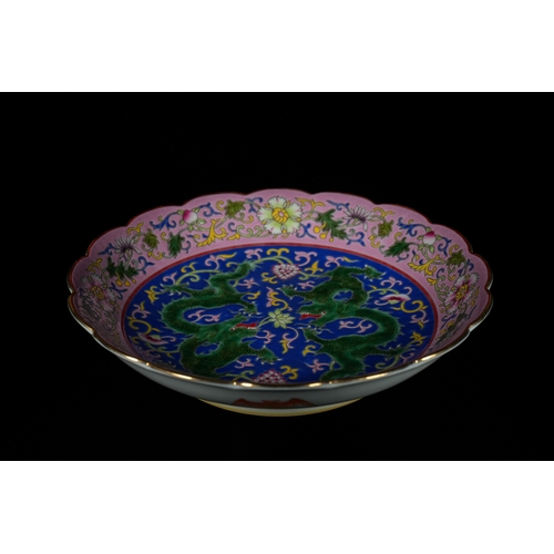 312 - A Chinese Polychrome Enamel Dragon Scalloped Plate, Qianlong Mark. - A Chinese porcelain scalloped p... 