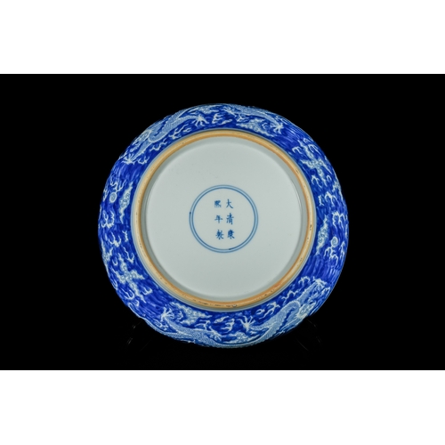 315 - A Chinese Blue and White 'Dragon' Dish, Kangxi Mark. - A Chinese blue and white 'dragon' dish, beari... 