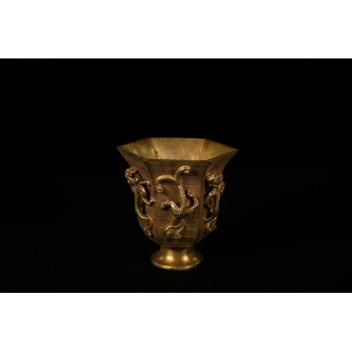 325 - A Chinese Gilt Bronze Dragon Wine Cup, 20th Century. - A Chinese Gilt Bronze Dragon Wine Cup. This h... 