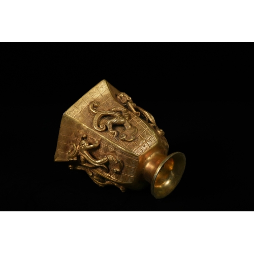 325 - A Chinese Gilt Bronze Dragon Wine Cup, 20th Century. - A Chinese Gilt Bronze Dragon Wine Cup. This h... 