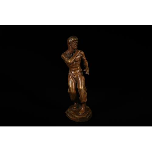 327 - A Bronze Sculpture of Bruce Lee, Attributed to Mavchi. - A bronze sculpture depicting Bruce Lee, att... 