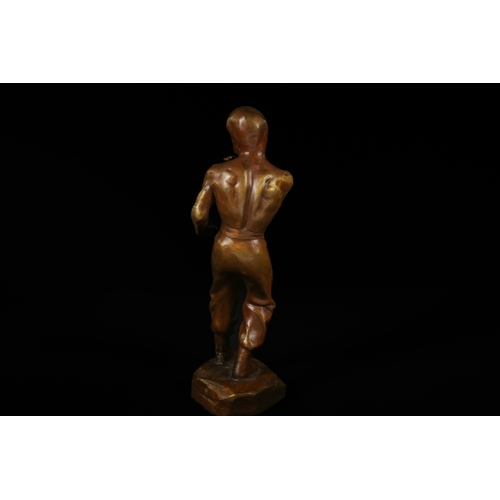 327 - A Bronze Sculpture of Bruce Lee, Attributed to Mavchi. - A bronze sculpture depicting Bruce Lee, att... 