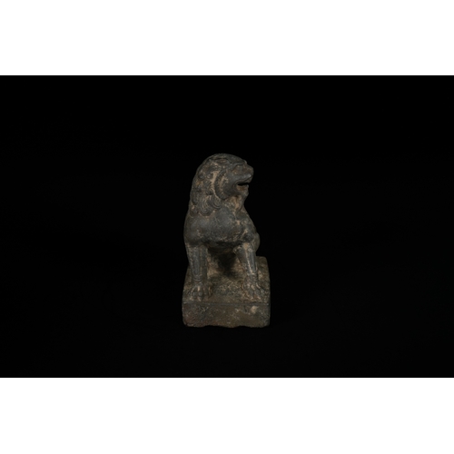330 - A Chinese Carved Stone Guardian Lion (Foo Dog), Tang or Song Dynasty - A dark, patinated sculpture d... 
