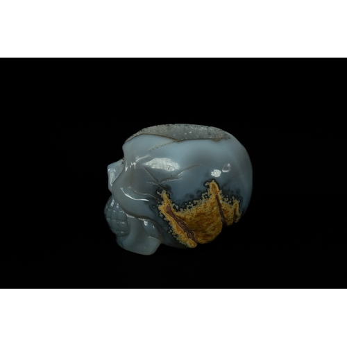 344 - A Chinese Agate Geode Carved Agate Skull. - A Chinese Agate Geode Hand Carved Realistic Crystal Skul... 