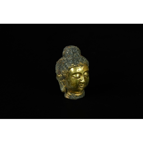 346 - A Chinese Tibetan Gilded Bronze Buddha Head, 19th Century or Later. - A fragmented head, likely repr... 